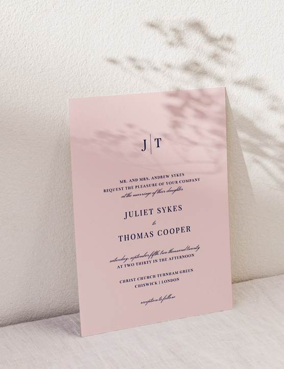 A tall and thin wedding menu card design. The menu has the word “love” printed at the top, above the details of a wedding feast.