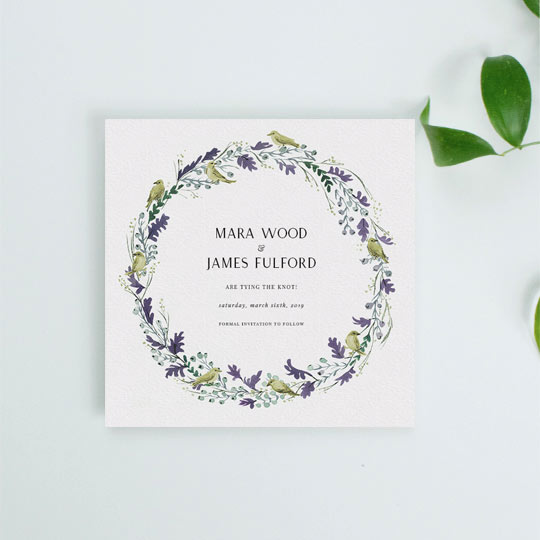 Wedding Save the Date Card (Classic) - "Birdsong (Save the Date)" A classic wedding save the date card with a purple and gold floral wreath. The wreath has wild birds and oak leaves painted in it. The names of an engaged couple, and the wedding details are printed at the bottom.