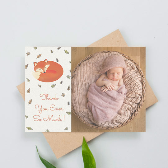 Baby Thank You Card - "Sleepy Fox" A landscape baby thank you card with a sleep fox surrounded by autumn leaves. It reads “Thank you ever so much”. There is a picture of a baby girl to the right-hand side.