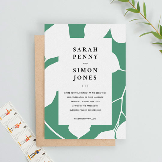 Wedding Invitation (Elegant) - "White on Green" A modern elegant wedding invitation card. The background border is green with the white impression of leaves and flowers. The text in the centre sits on a white background with elegant wedding invitation text printed in black.