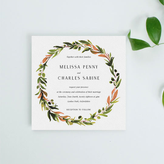 Wedding Invitation - "Watercolour Olive Wreath (Wedding Invitation)" A square wedding invitation with a classic floral wreath. The invitation’s wreath is painted with shades of greens and oranges. The font is classic and simple.