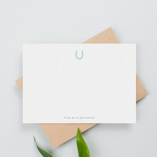Personalised Note Card (Couples) - "Everyone needs luck" A personalised note card with a blue horseshoe printed at the top. The name of a couple if printed at the bottom.
