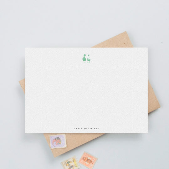 Personalised Note Card (Couples) - "Two little ducks" A predominantly white correspondence card, with two blue duck, side-by-side at the top. The names of a husband and wife is printed at the bottom.