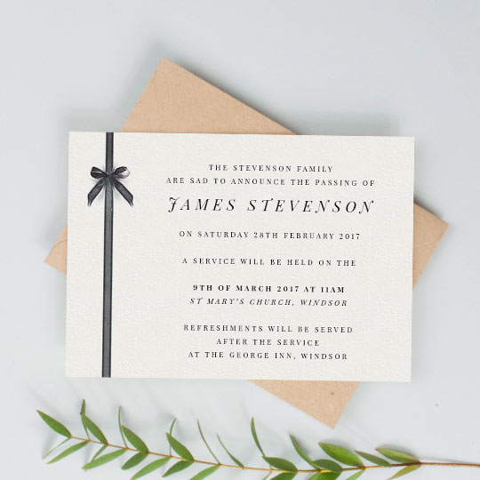 Funeral Invitation Card - "Gracefully tied" A classic, landscape funeral invitation card. It has a painted black ribbon running down the left-hand side. The details of a funeral are printed on the right-hand side of the card.